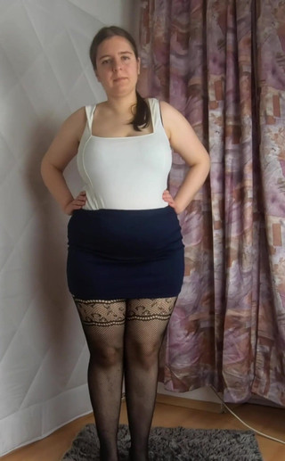 Mini skirt heels and fishnet stockings