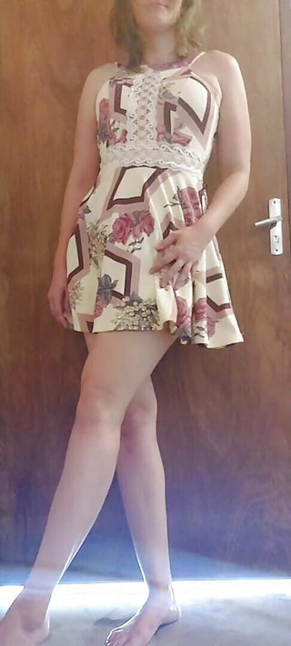 Playful in sexy dress gets the urge masturbating