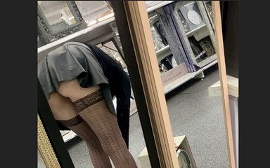 Shopping in leather mini skirt no panties